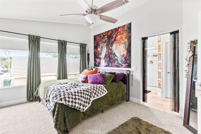 bedroom with carpet floors, a ceiling fan, and baseboards