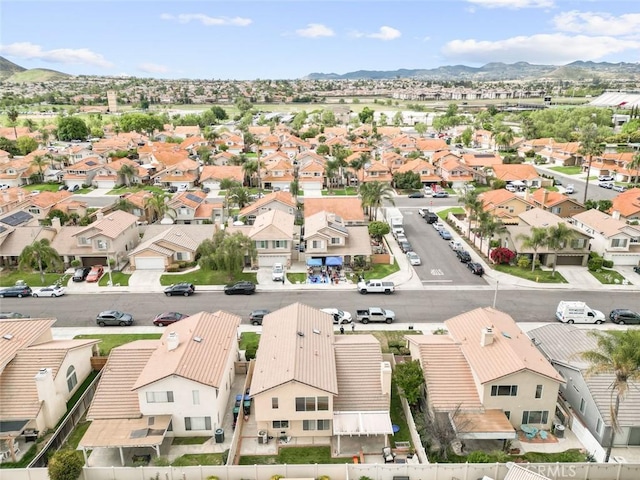 drone / aerial view featuring a mountain view and a residential view