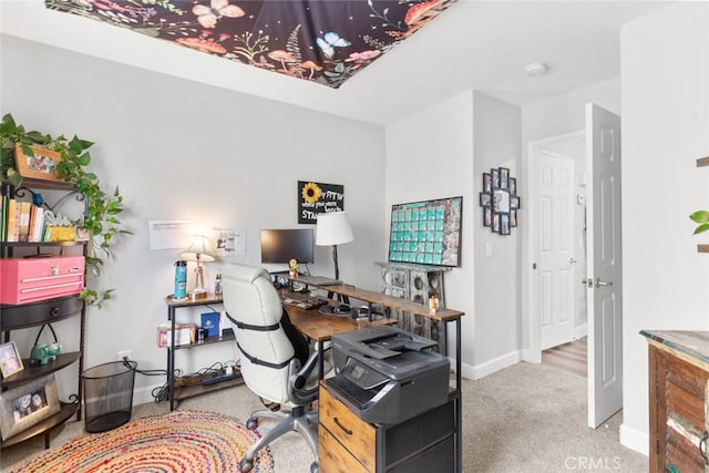 office featuring baseboards and carpet
