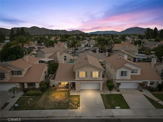 aerial view featuring a residential view and a mountain view