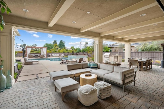 956 Urania Ave, Encinitas, CA 92024 - view of patio / terrace featuring outdoor dining area, an outdoor hangout area, a fenced backyard, area for grilling, and exterior kitchen