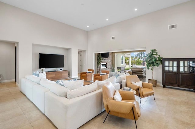956 Urania Ave, Encinitas, CA 92024 - living room with a high ceiling, light tile patterned floors, baseboards, and recessed lighting