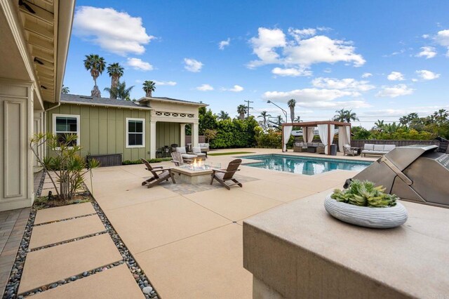 956 Urania Ave, Encinitas, CA 92024 - view of swimming pool with an outdoor living space with a fire pit and a patio
