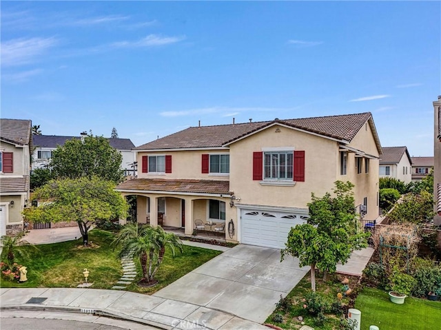 11913 Solitaire Ct, Jurupa Valley, CA 91752 - traditional-style house with an attached garage, a front lawn, stucco siding, a porch, and concrete driveway