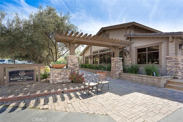 view of patio / terrace featuring a pergola