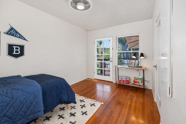 bedroom featuring wood finished floors
