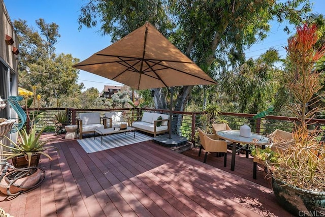 deck with an outdoor living space and outdoor dining space