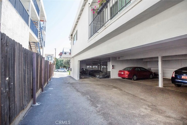 exterior space featuring aphalt driveway