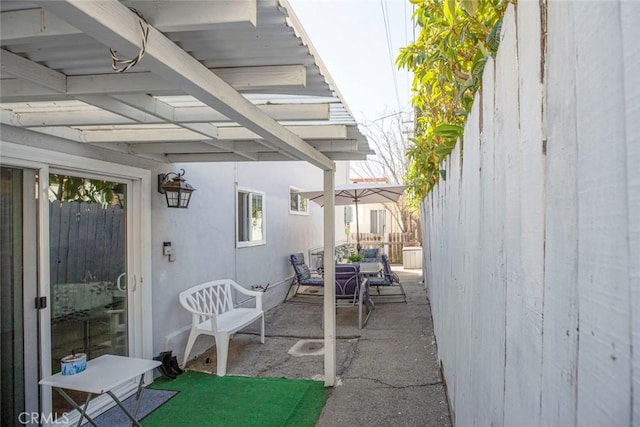 view of patio with outdoor dining area