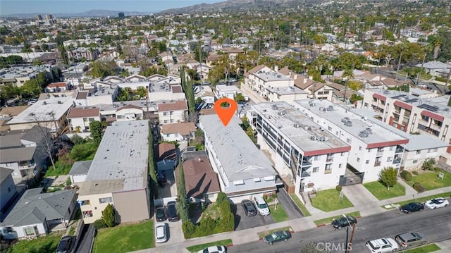 aerial view with a mountain view and a residential view