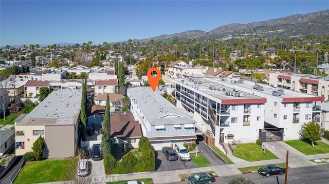 bird's eye view featuring a residential view and a mountain view