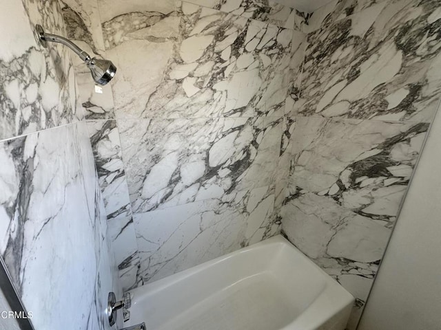 full bath featuring  shower combination