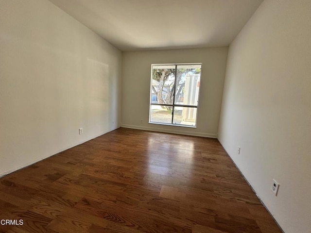 empty room featuring wood finished floors