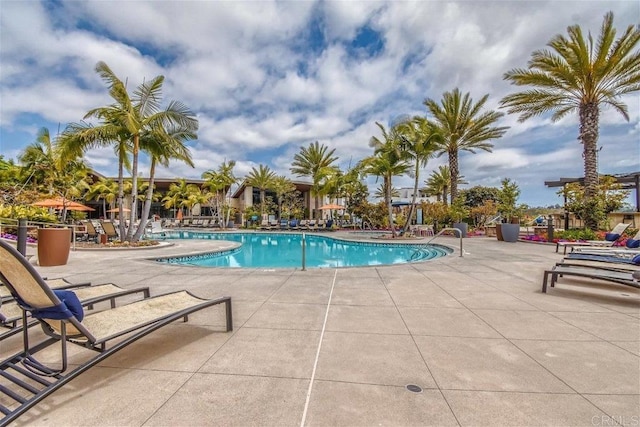 pool with a patio area