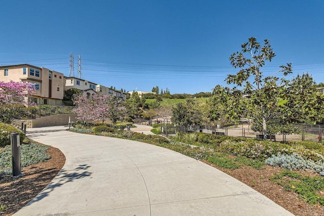 surrounding community featuring fence