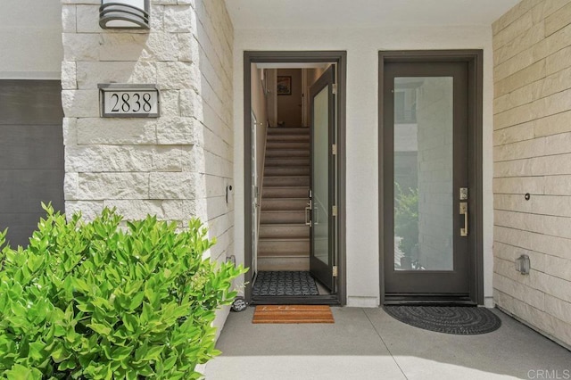 view of exterior entry with stone siding