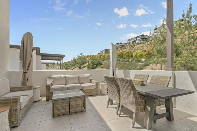 view of patio / terrace featuring an outdoor hangout area and outdoor dining area