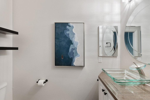 687 S Coast Highway 101 Unit 232, Encinitas, CA 92024 - bathroom featuring vanity and toilet