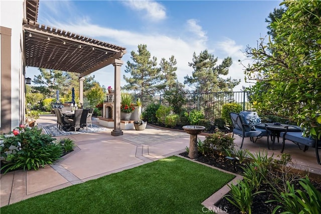 view of yard featuring a patio, a pergola, fence, and outdoor dining space