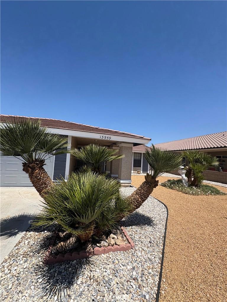 view of front of house featuring stucco siding