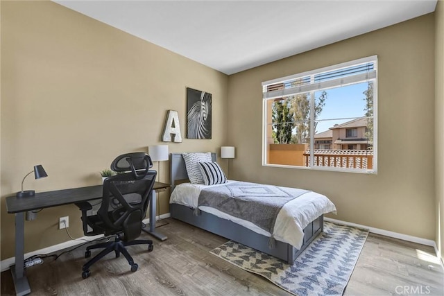 2641 Dunstan Dr, Tustin, CA 92782 - bedroom with baseboards and wood finished floors