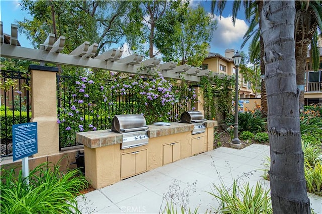 2641 Dunstan Dr, Tustin, CA 92782 - view of patio with fence, a grill, and area for grilling