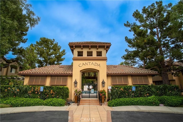 2641 Dunstan Dr, Tustin, CA 92782 - mediterranean / spanish home with stucco siding and a tile roof