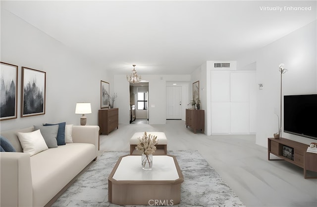 2240 S Palm Canyon Dr Unit 20, Palm Springs, CA 92264 - living room with a chandelier