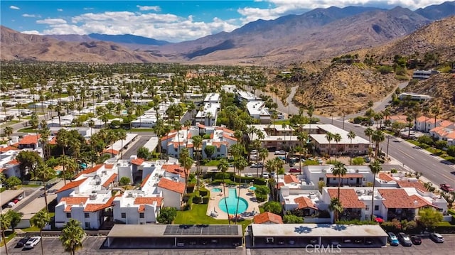 2240 S Palm Canyon Dr Unit 20, Palm Springs, CA 92264 - aerial perspective of suburban area featuring a mountainous background and a pool