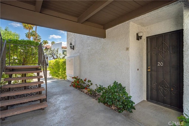 2240 S Palm Canyon Dr Unit 20, Palm Springs, CA 92264 - doorway to property featuring stucco siding
