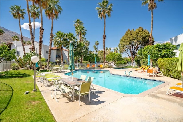 2240 S Palm Canyon Dr Unit 20, Palm Springs, CA 92264 - community pool featuring a patio and a mountain view