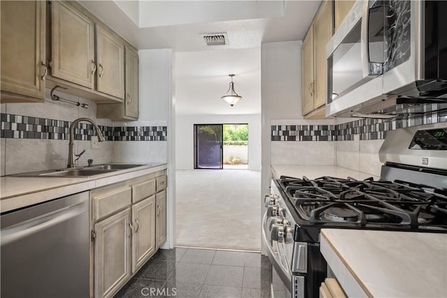 2240 S Palm Canyon Dr Unit 20, Palm Springs, CA 92264 - kitchen with appliances with stainless steel finishes, a sink, light countertops, granite tiled floors, and backsplash