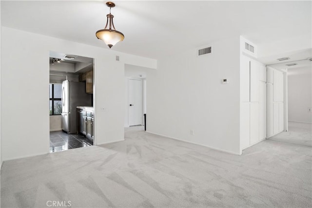 2240 S Palm Canyon Dr Unit 20, Palm Springs, CA 92264 - unfurnished room with light carpet and baseboards