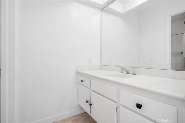 2240 S Palm Canyon Dr Unit 20, Palm Springs, CA 92264 - bathroom with vanity and baseboards