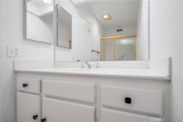 2240 S Palm Canyon Dr Unit 20, Palm Springs, CA 92264 - bathroom with a shower stall and vanity
