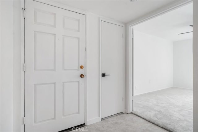 2240 S Palm Canyon Dr Unit 20, Palm Springs, CA 92264 - entrance foyer featuring light colored carpet and baseboards