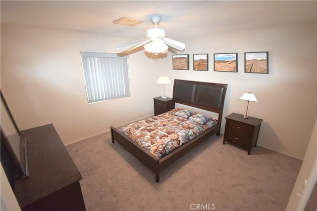 bedroom with baseboards and carpet flooring