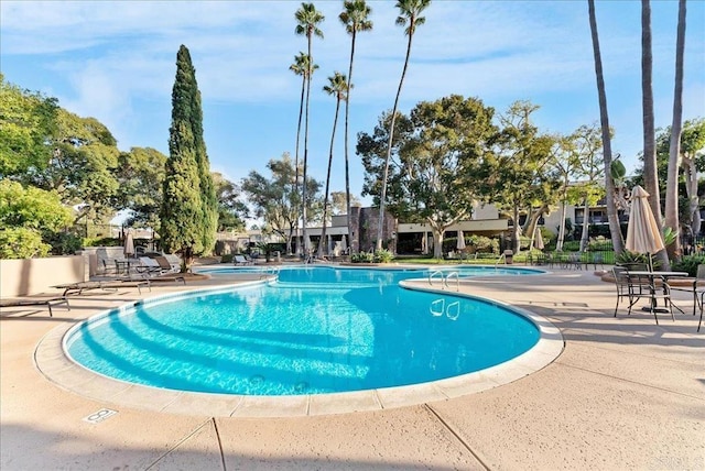 pool with a patio