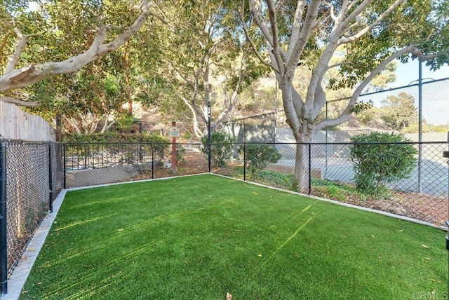 view of yard featuring fence