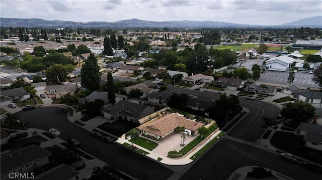 drone / aerial view featuring a mountain view and a residential view