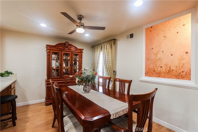 dining room featuring visible vents, a ceiling fan, light wood-style flooring, and recessed lighting