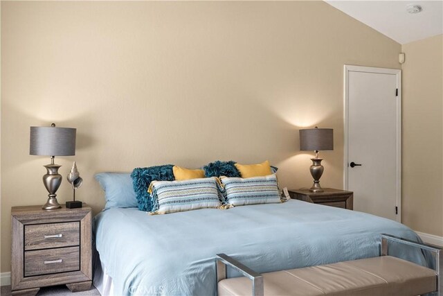 1635 Almendia Dr, Chico, CA 95926 - bedroom featuring lofted ceiling and baseboards