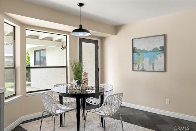dining room with baseboards
