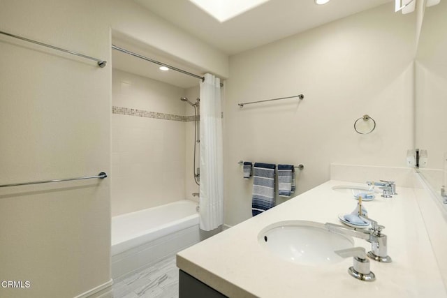 5580 Bromely Dr, Oak Park, CA 91377 - bathroom featuring recessed lighting, shower / tub combo with curtain, double vanity, and a sink