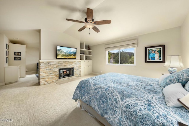 5580 Bromely Dr, Oak Park, CA 91377 - bedroom with a fireplace, carpet floors, baseboards, ceiling fan, and lofted ceiling