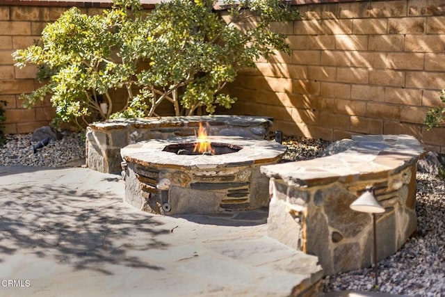 5580 Bromely Dr, Oak Park, CA 91377 - view of patio / terrace featuring an outdoor fire pit