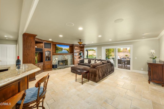 5580 Bromely Dr, Oak Park, CA 91377 - living room with baseboards, recessed lighting, crown molding, and a lit fireplace