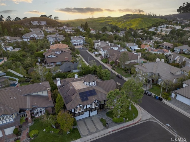 drone / aerial view with a mountain view and a residential view