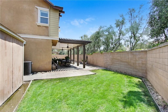 view of yard with a fenced backyard, a patio, ceiling fan, and cooling unit