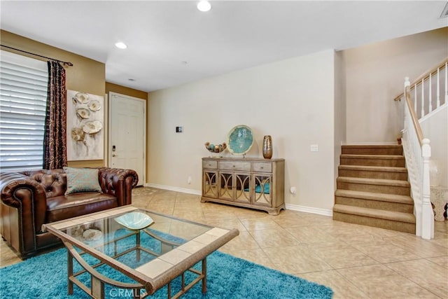 tiled living room with visible vents, recessed lighting, stairs, and baseboards